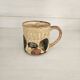 Set of 4 ceramic mugs, glazed stoneware, assorted vintage designs.
