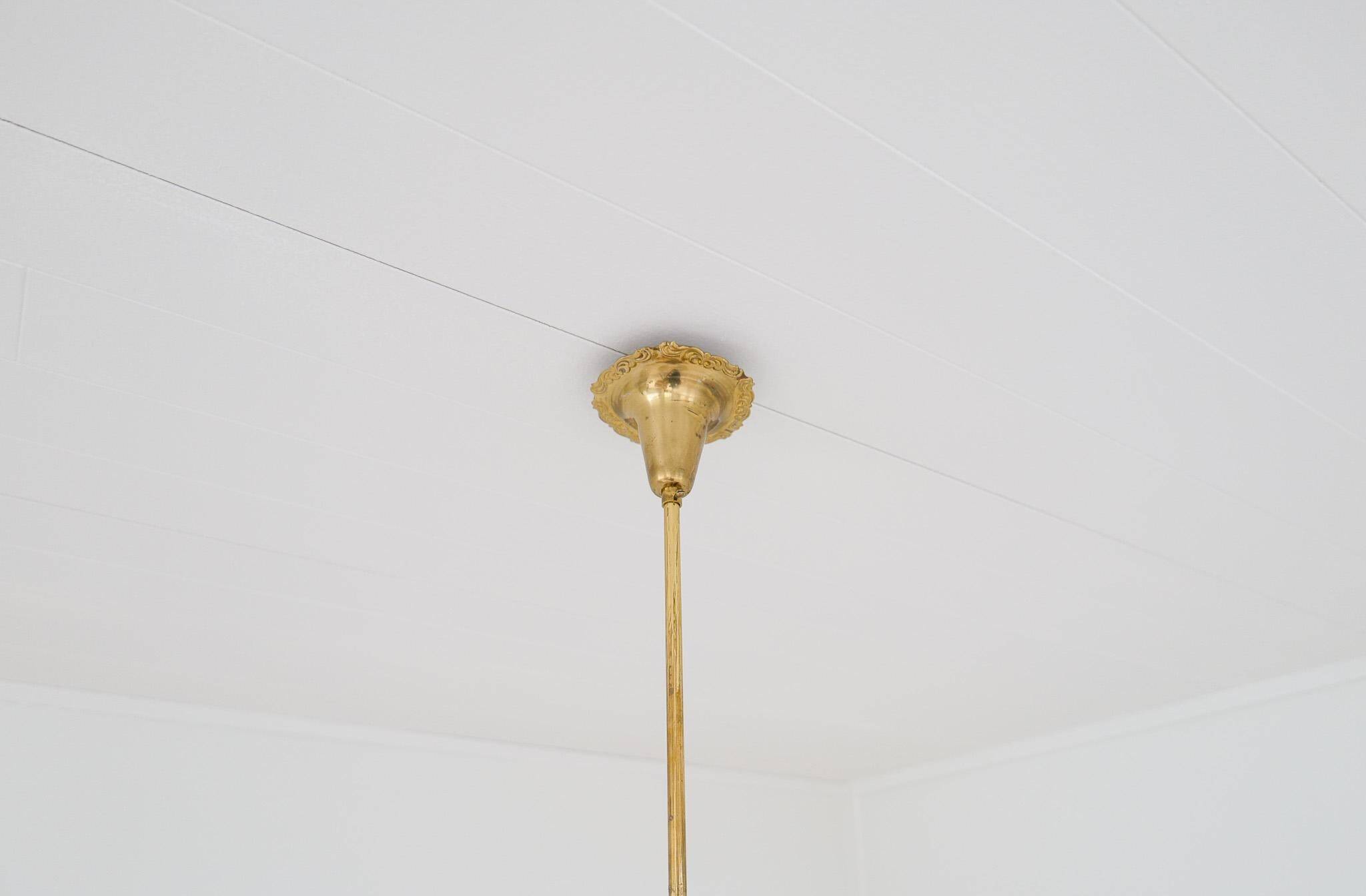 Mid-century brass and glass pendant light by Sario, Finland, 1950s.