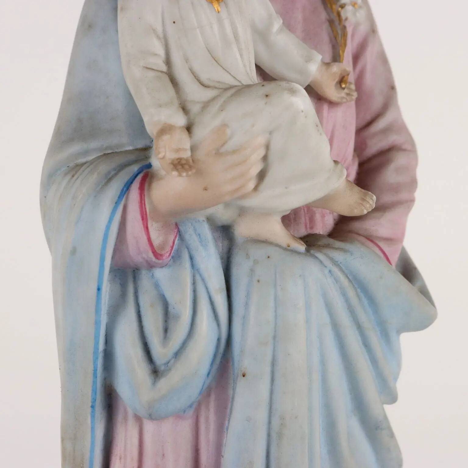 Ancient sculpture of Saint Joseph in a display case, Italy 1900s, polychrome porcelain.