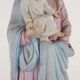 Ancient sculpture of Saint Joseph in a display case, Italy 1900s, polychrome porcelain.