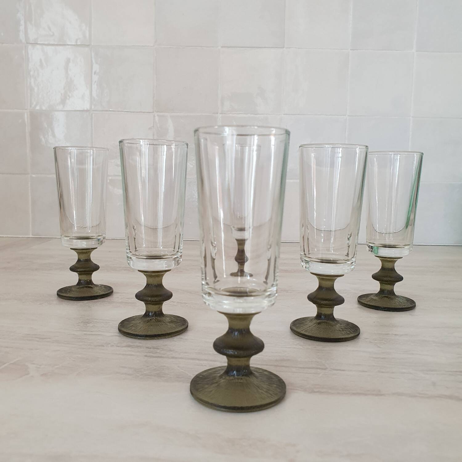 6 small green foot flutes in the Timo Sarpaneva style