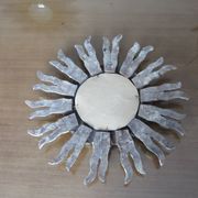Golden wooden sun mirror with inlays from the early 20th century.