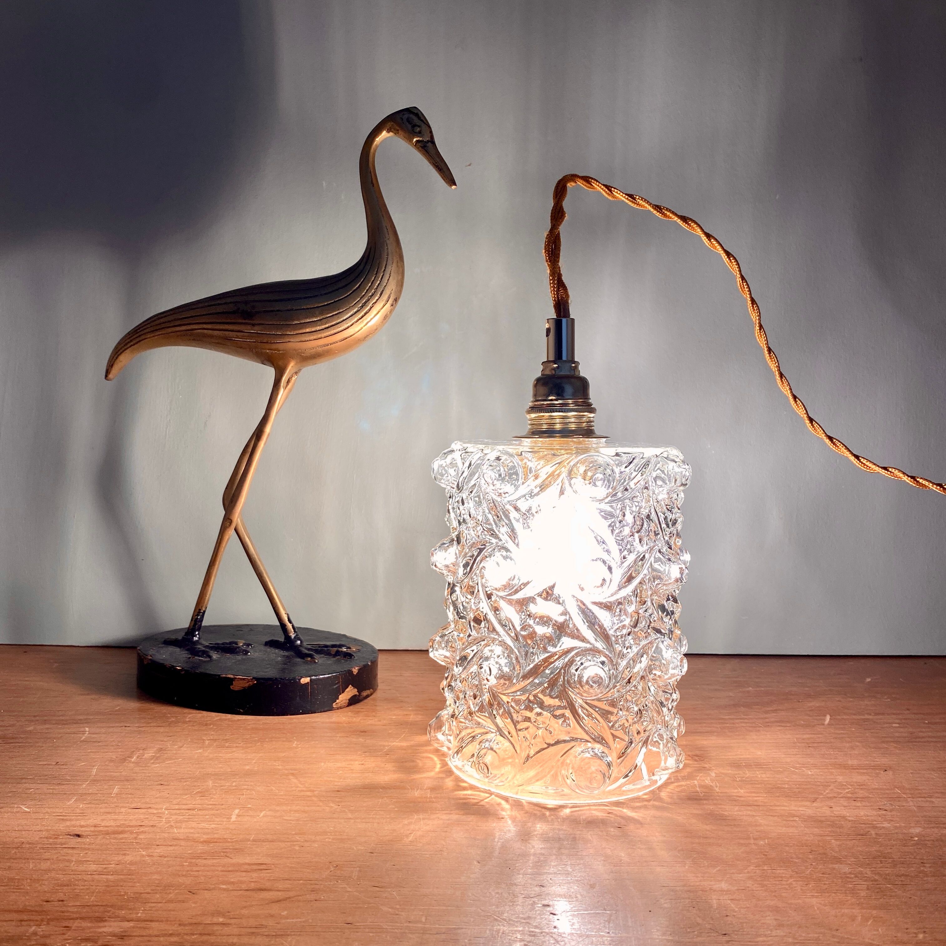 Vintage molded glass globe walker