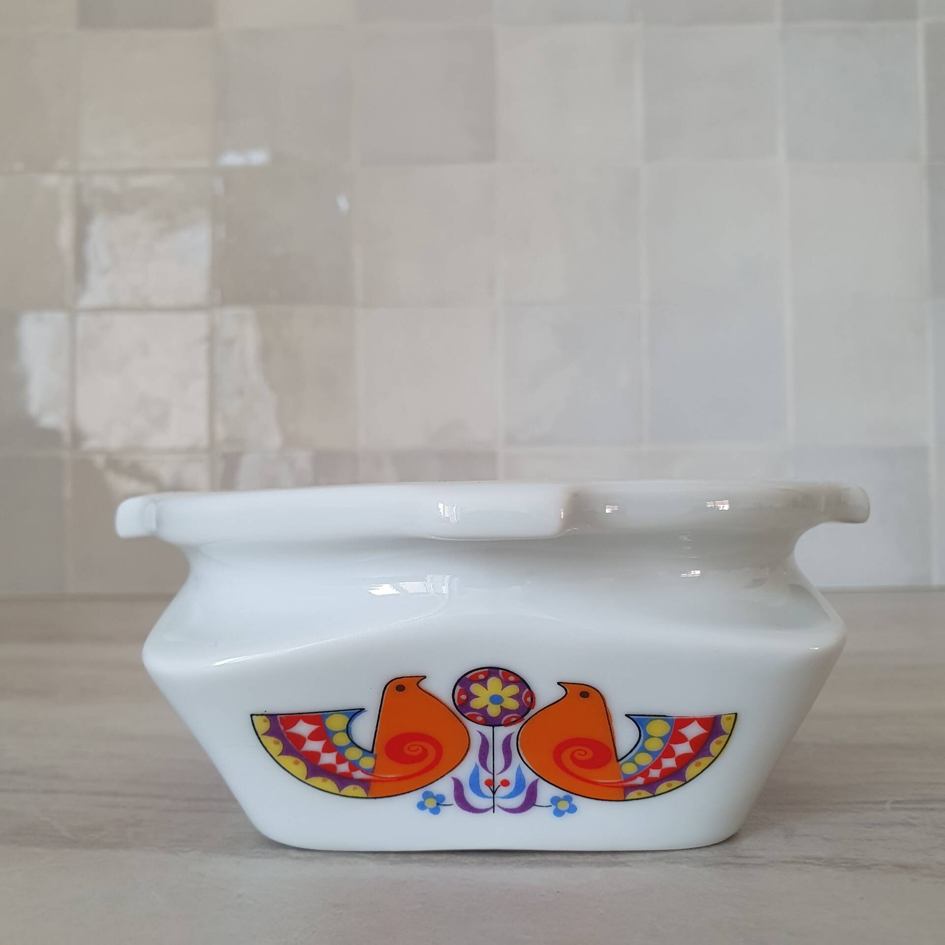 Ceramic ashtray with bird design