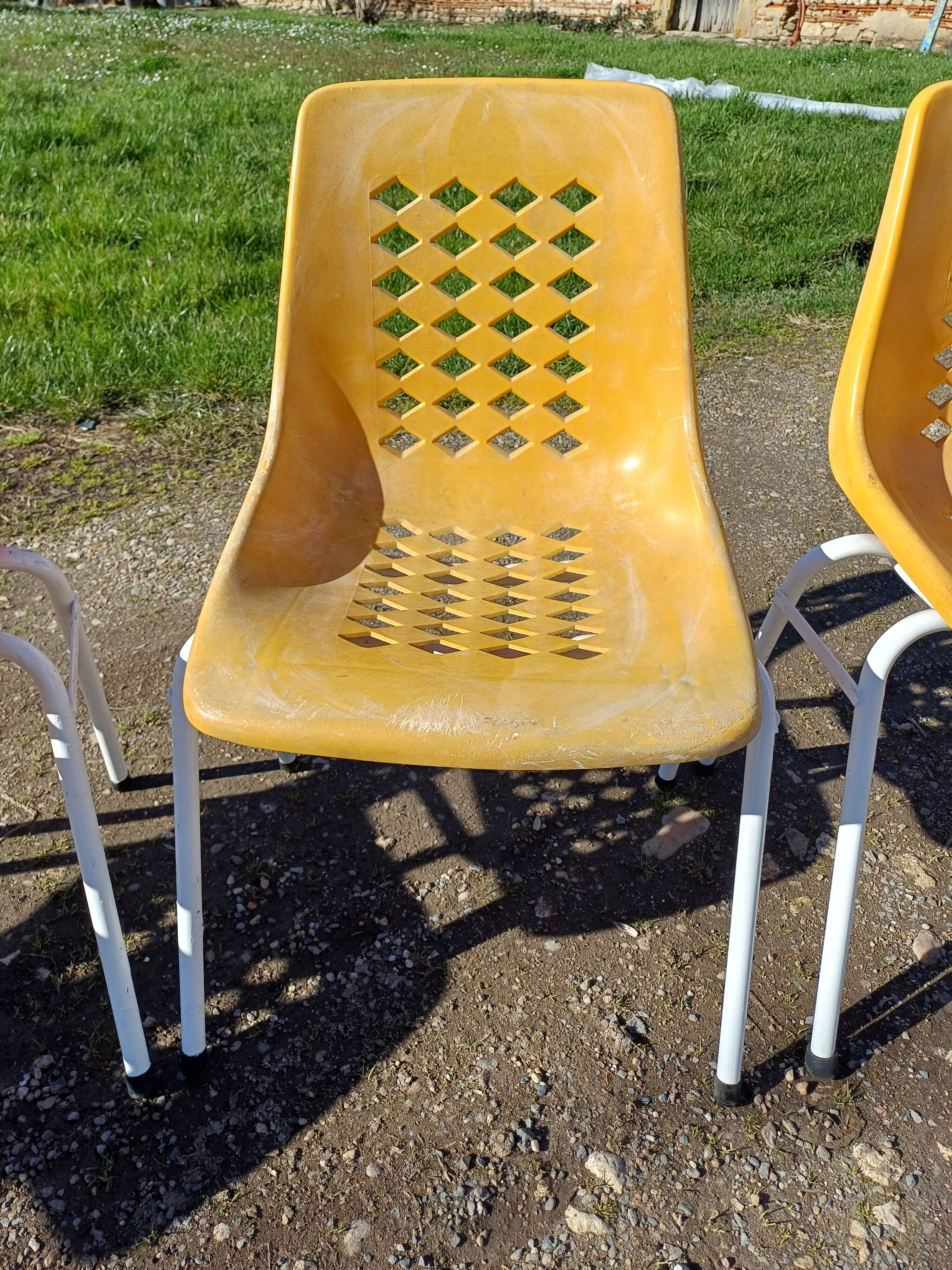 6 vintage iron and orange plastic garden chairs