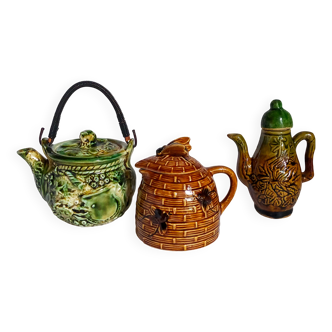 Set of old teapots and honey pot