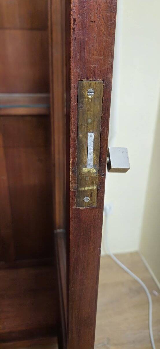 Important Art Deco library in amboyna and mahogany veneer.
