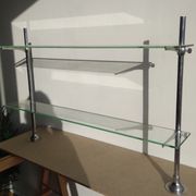 Glass and chrome metal shelf, store display