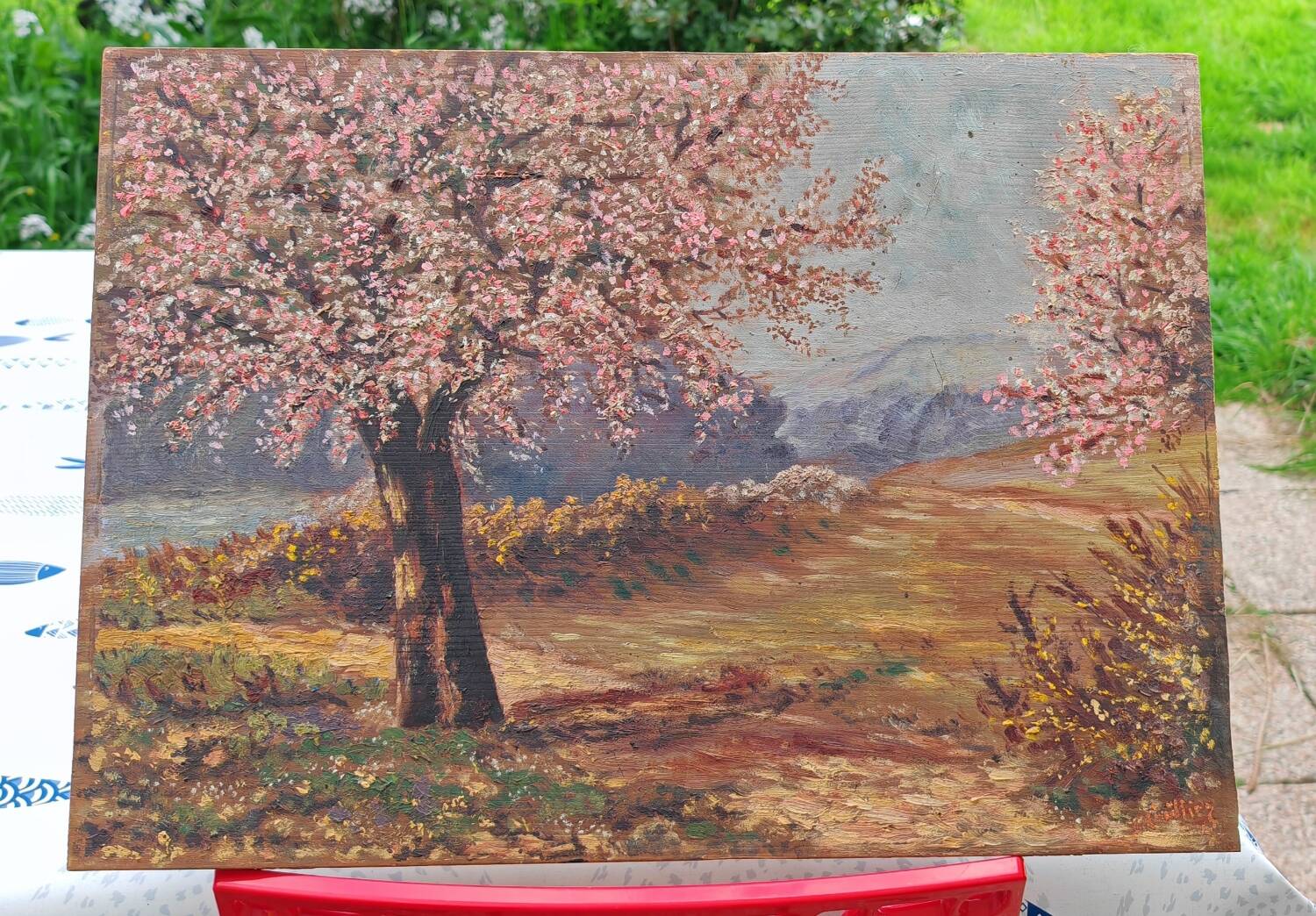 Apple trees in blossom oil on panel