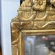 Small Louis XIV mirror in gilded carved wood from the early 18th century.