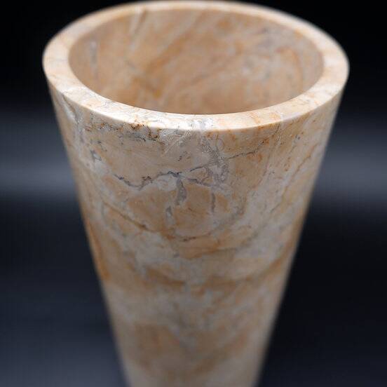 Cylindrical marble vase with fossil motif