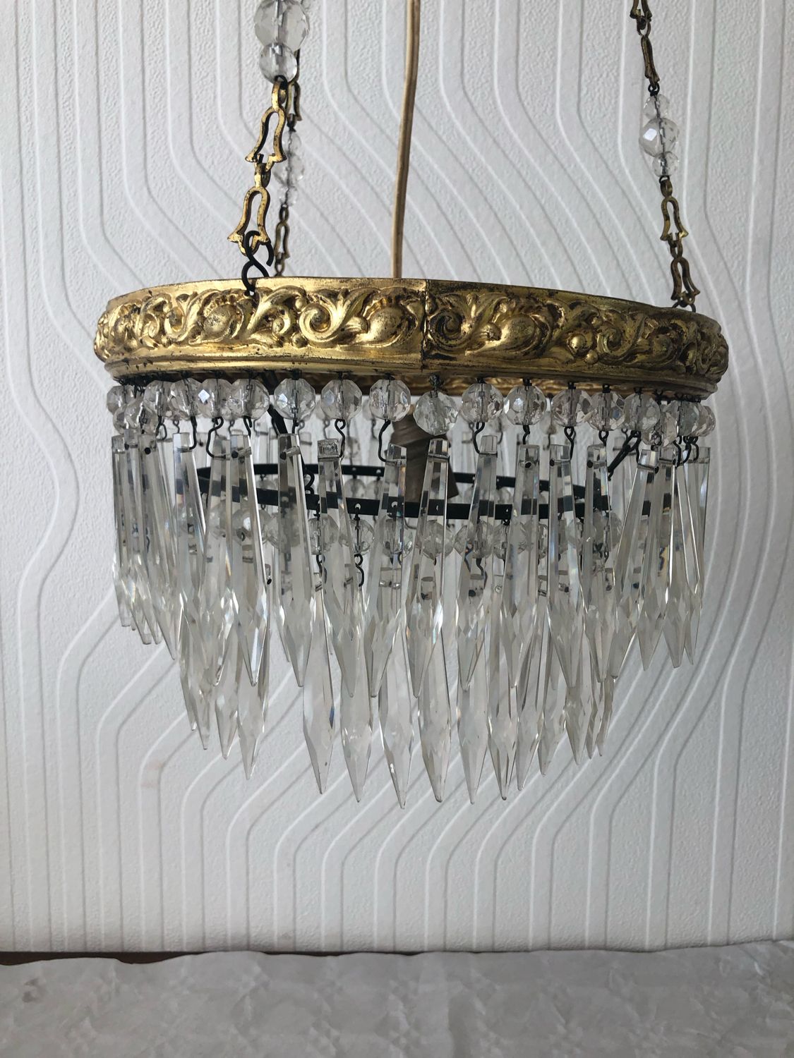 Vintage tassel chandelier has 2 glass and brass crowns