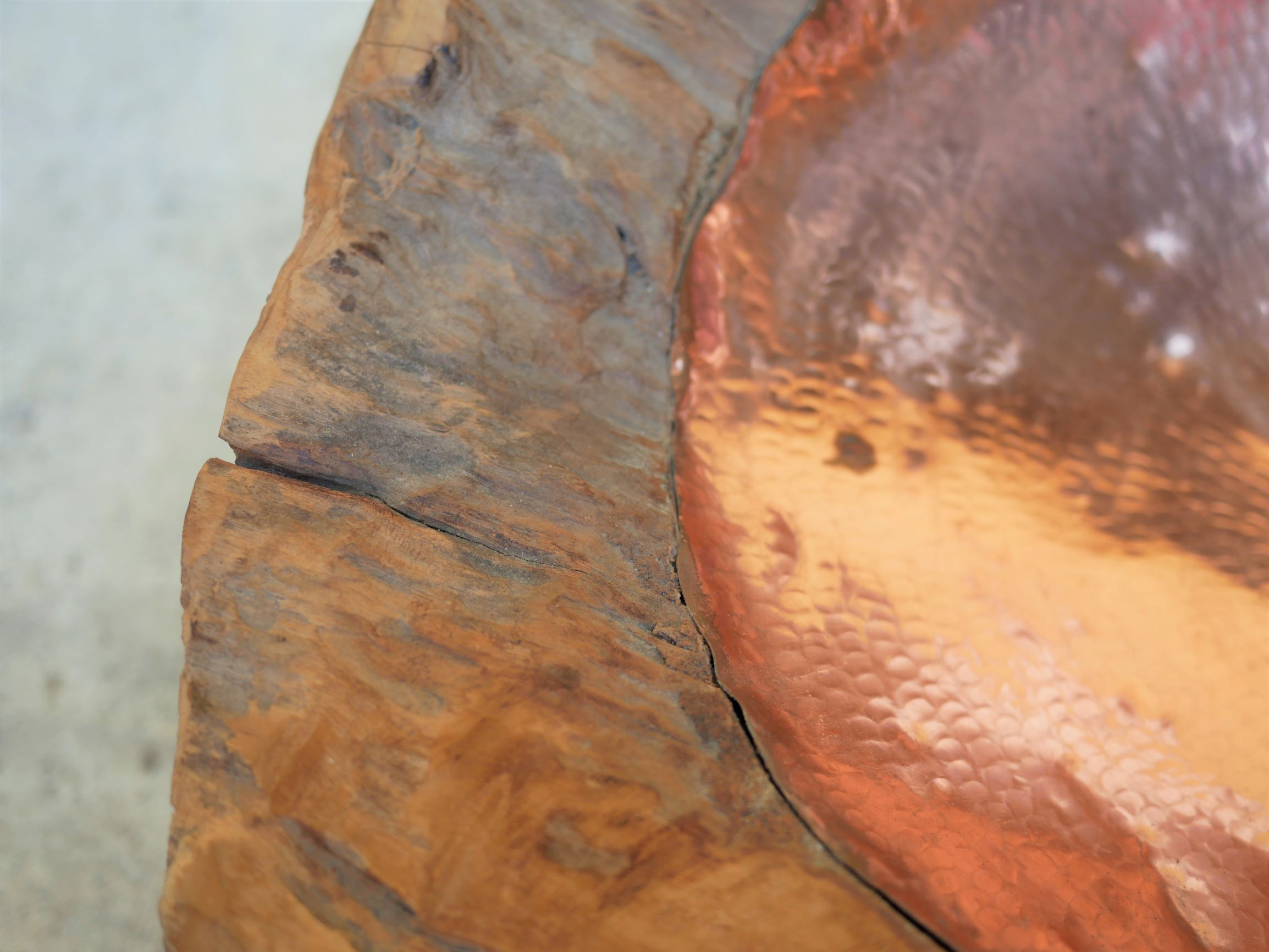 Empty wooden and copper pocket