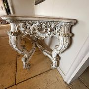 Large carved white wooden console