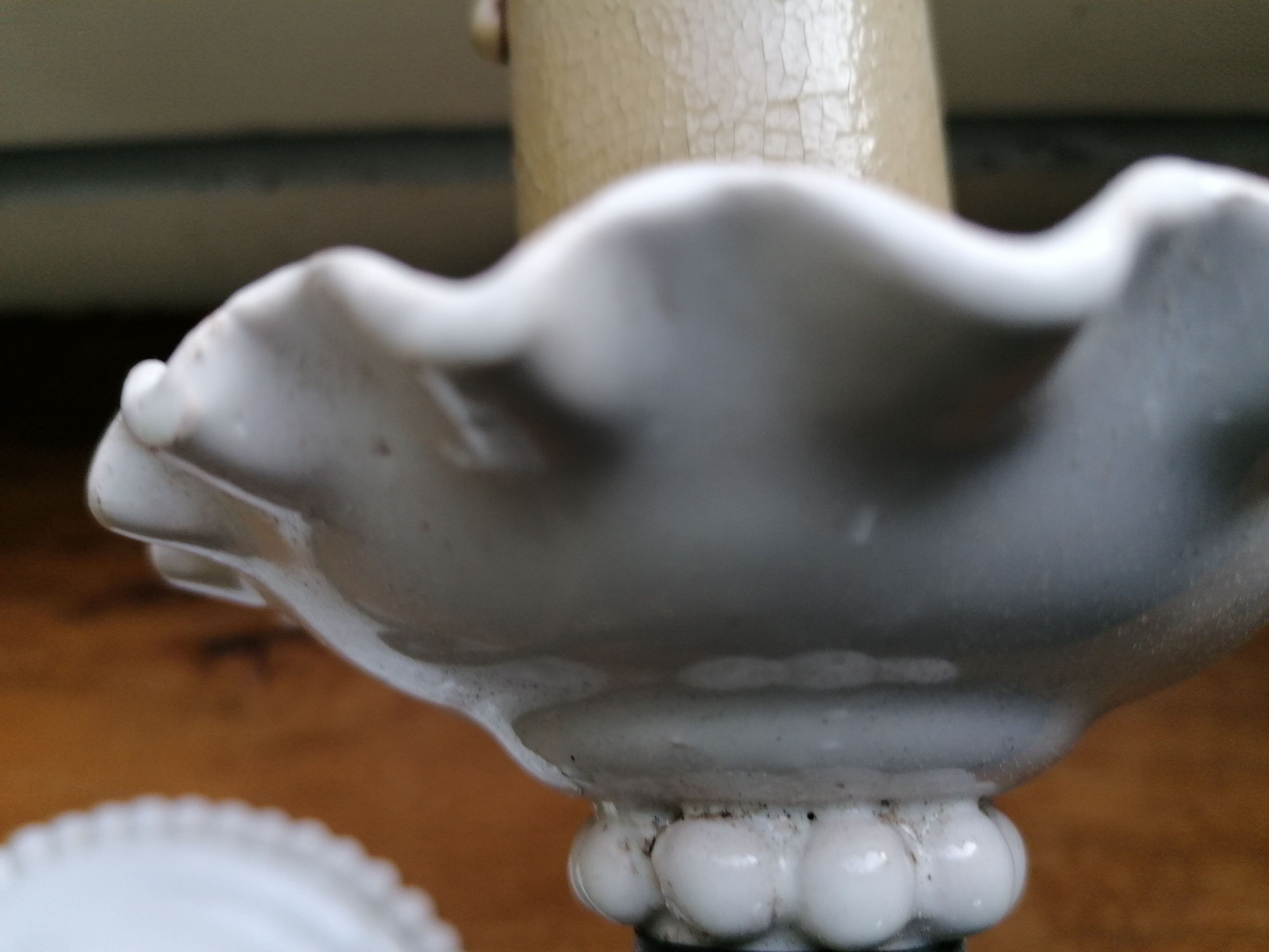 Pair of white faience wall lamps
