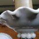 Pair of white faience wall lamps