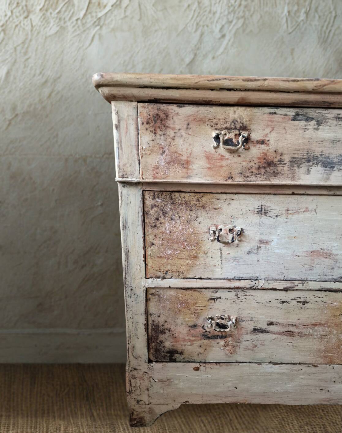 Antique patinated chest of drawers