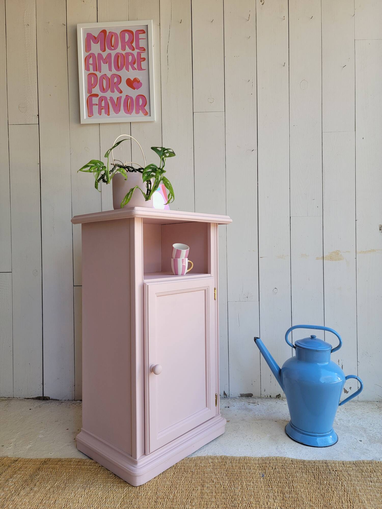 Antique bedside table revamped in pink.