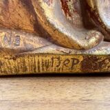 Statue of the Virgin holding the Child Jesus in polychrome terracotta.