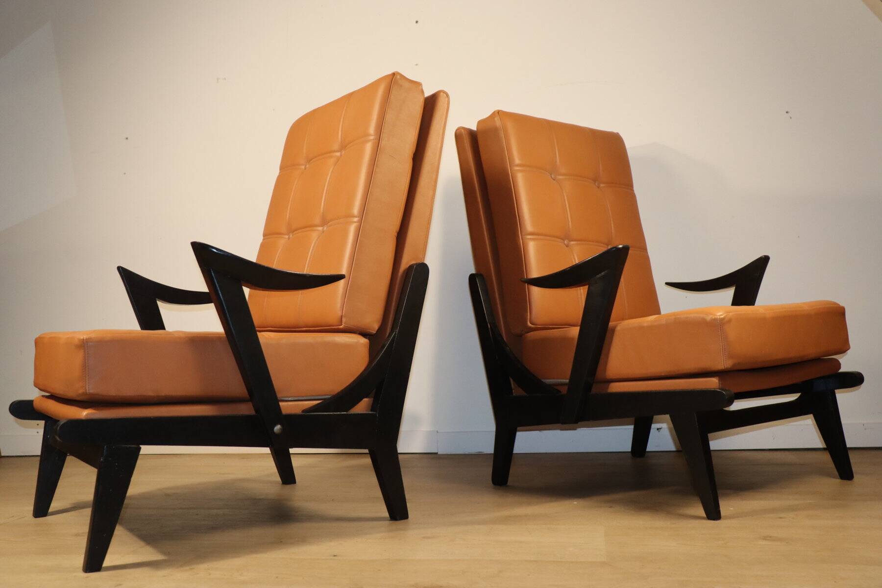Paire de fauteuils vintage années 50 en bois noir et cuir caramel