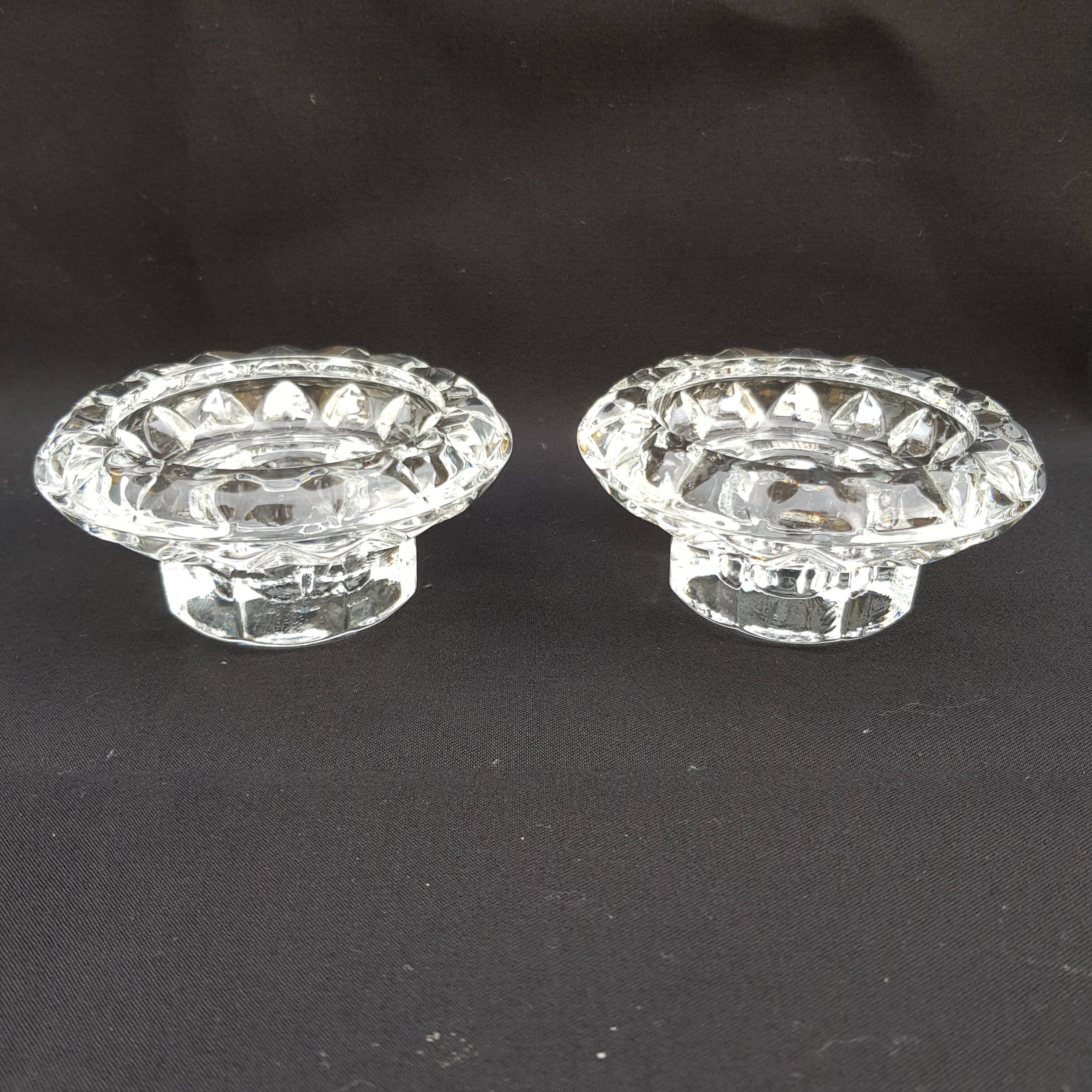 Duo of old glass candlesticks