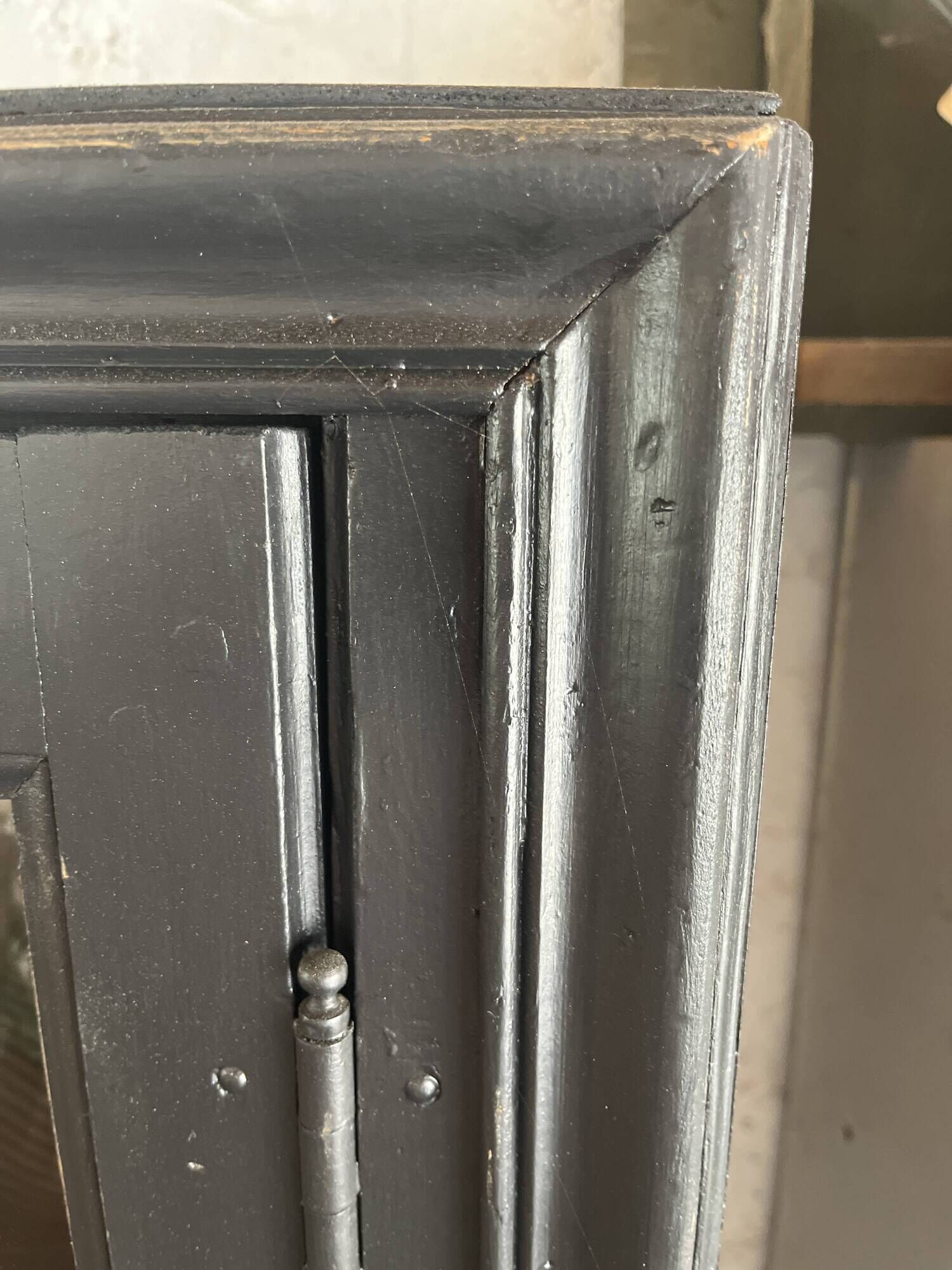 Aged patinated black display cabinet