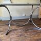 Living room table in smoked glass and vintage metal