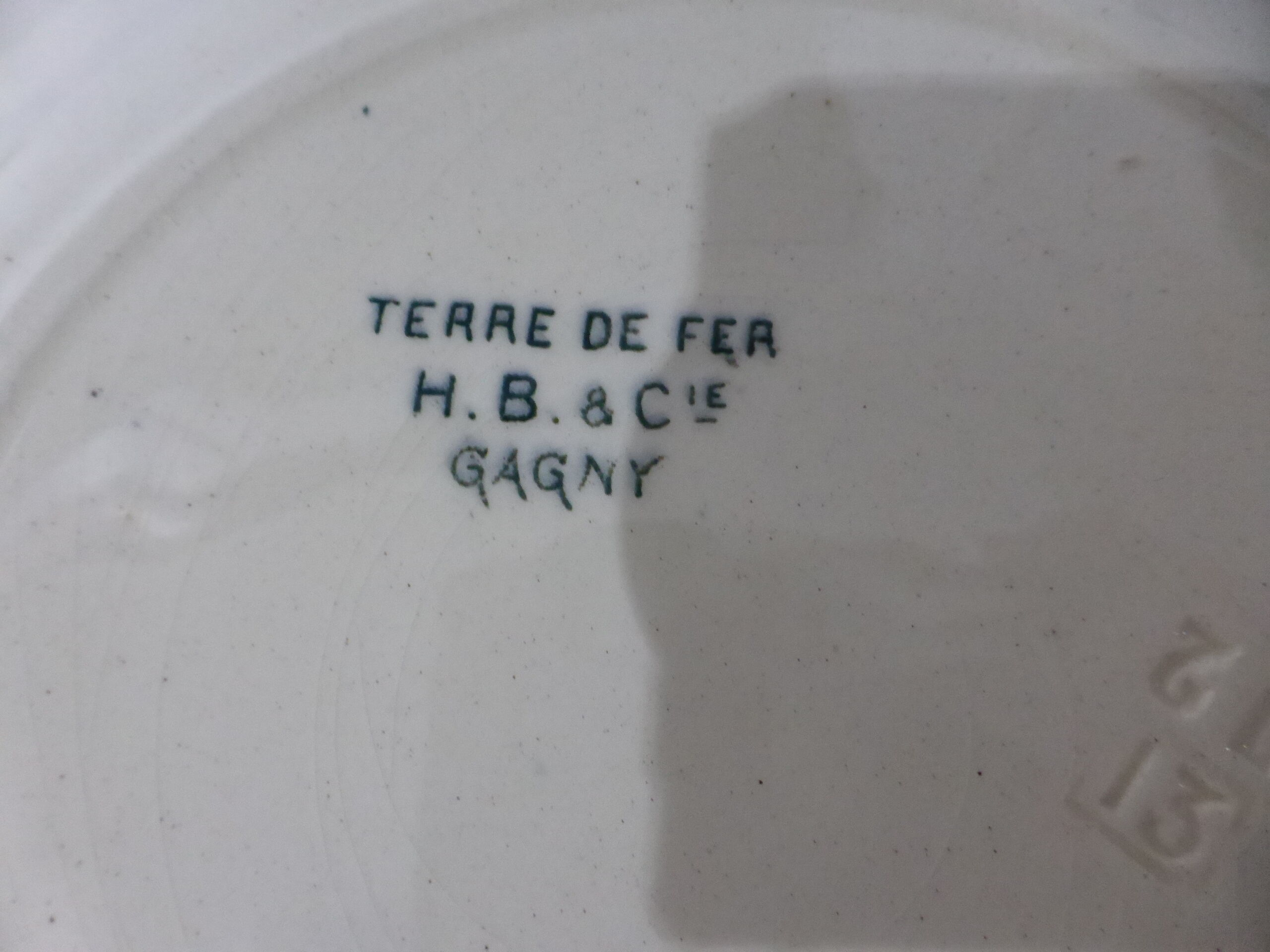 4 vintage flat plates in iron earth from HBC