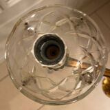 Golden brass chandelier and glass