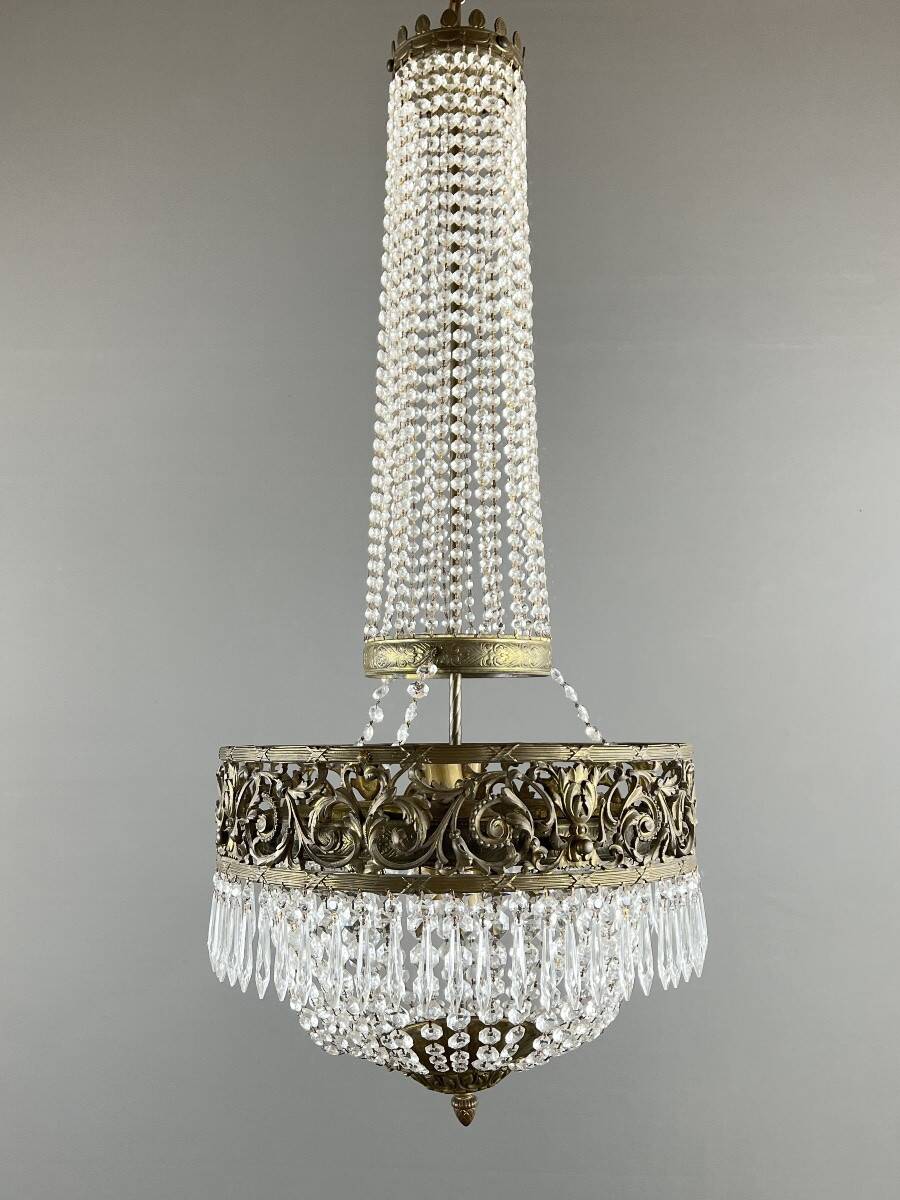 Empire-style chandelier in bronze with crystal pendants, early 20th century.