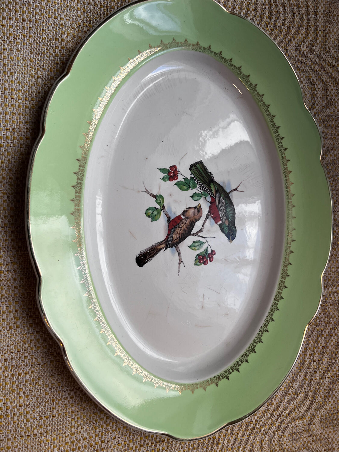 Old oval dish in Badonviller earthenware, decorated with Les Oiseaux.