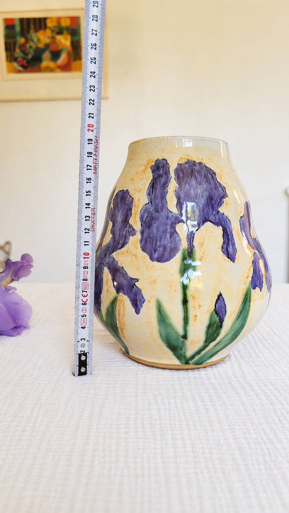 Hand-painted decorative vase with blue/purple irises.