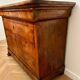 Antique solid wood chest of drawers with drawers and key.