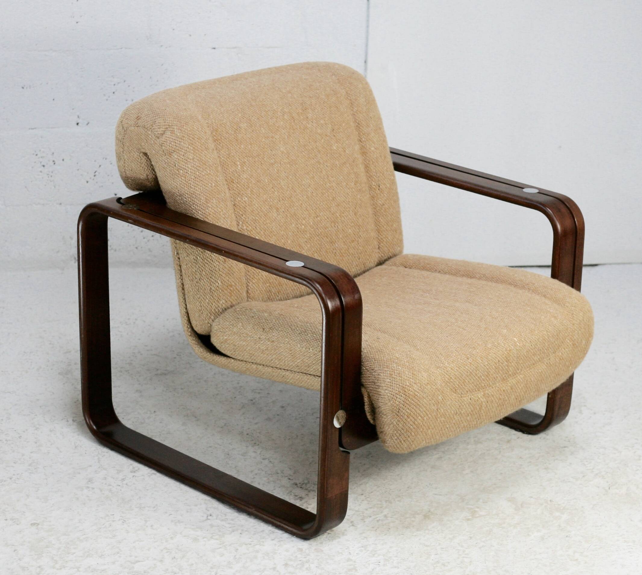 Modernist armchair. Wool, wood and steel. Circa 1970