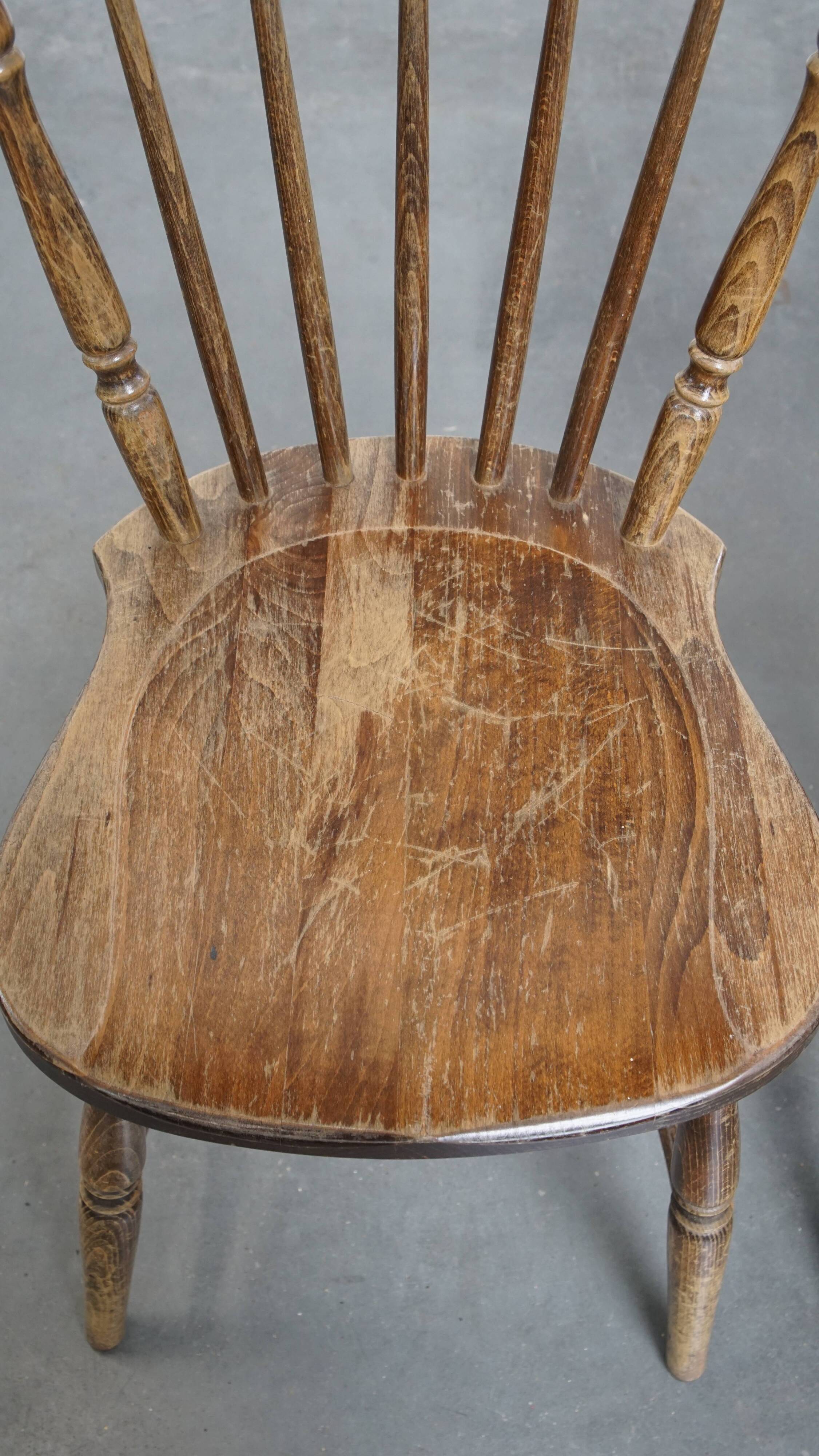Set of 8 antique wooden spindle chairs