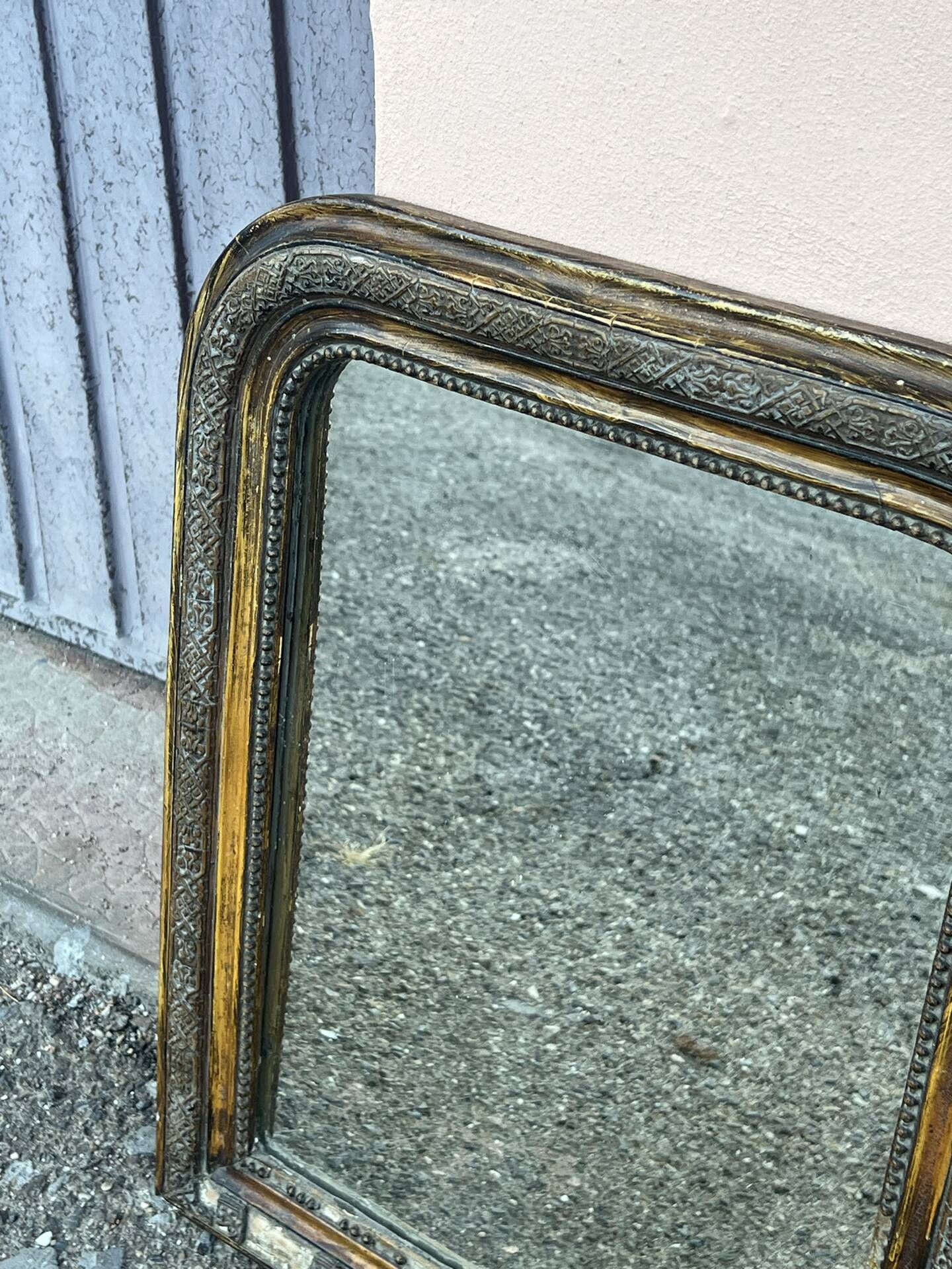 Miroir louis Philipe en bois doré sculpté fronton arrondi