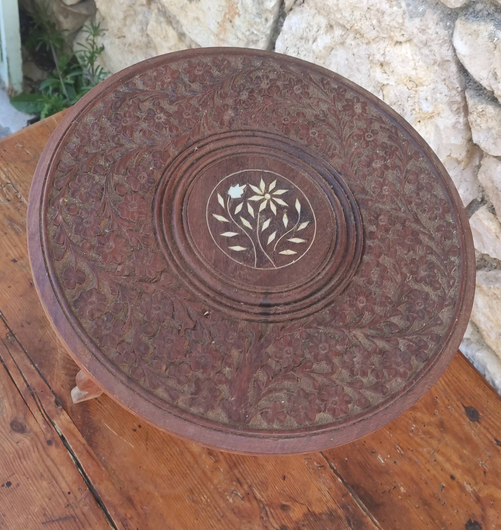 Old small carved wooden table