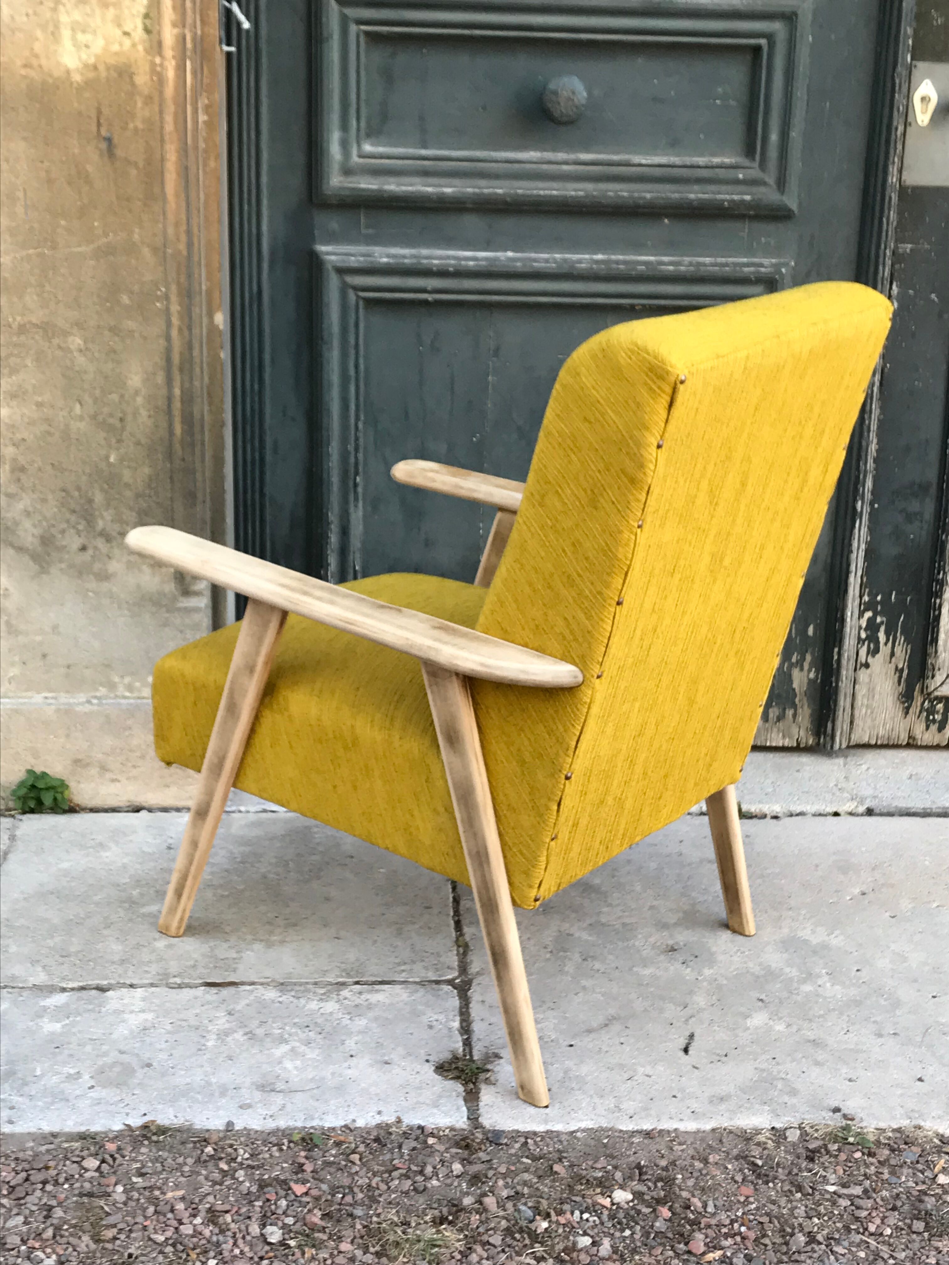 Fauteuil scandinave pieds compas