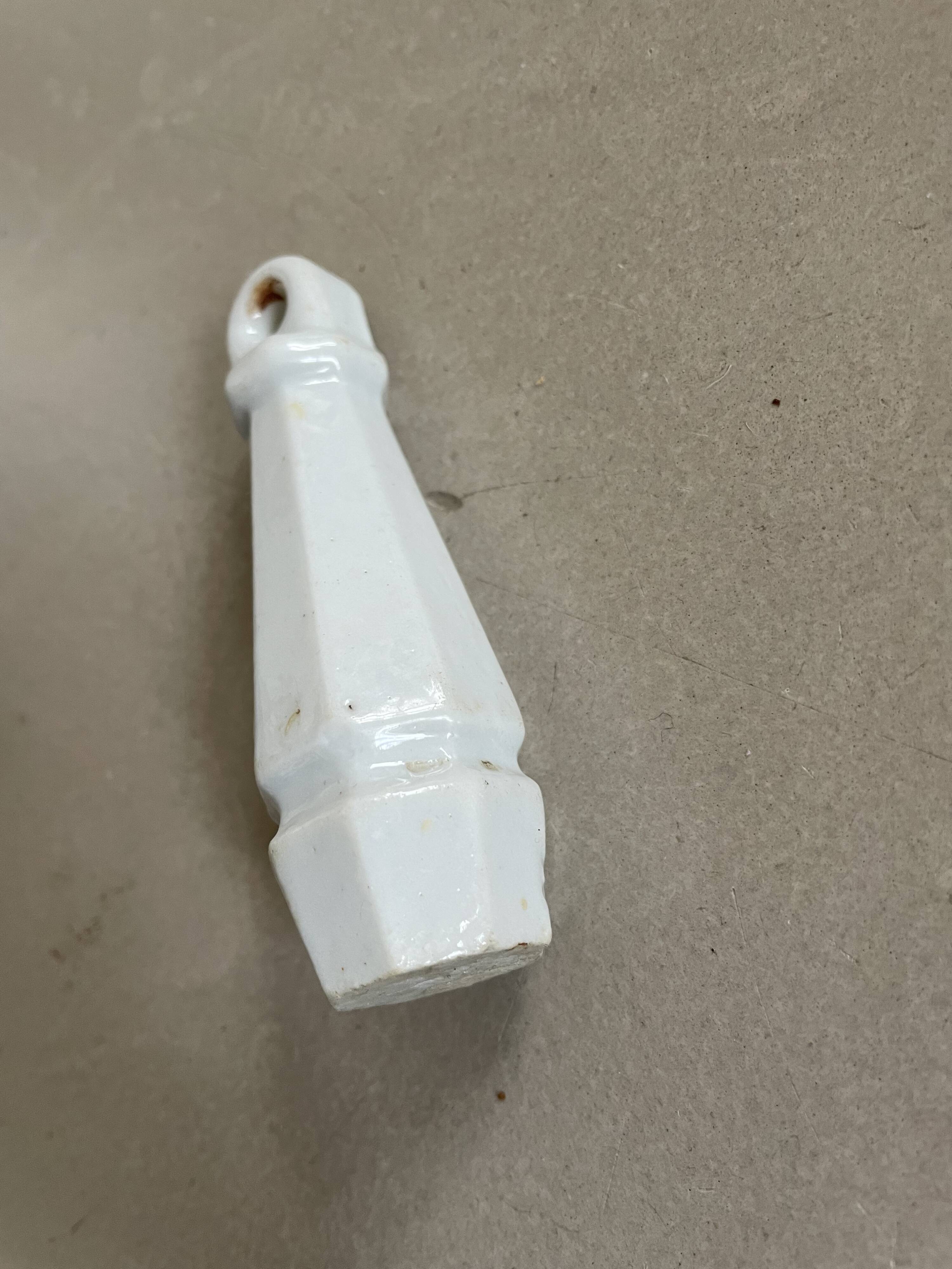 Ceramic flush handle