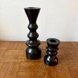 Pair of black turned wood candlesticks