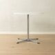 Timeless bistro table with star-shaped aluminium base