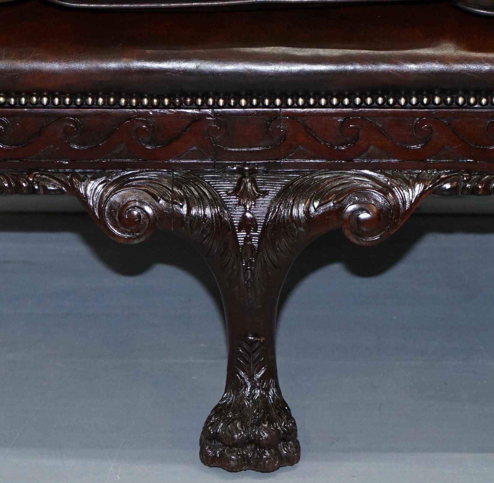 Chesterfield leather canapé in Georgian style with lion paw carved feet.
