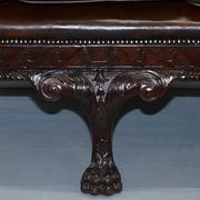Chesterfield leather canapé in Georgian style with lion paw carved feet.