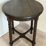 Antique turned wooden side table with authentic charm.