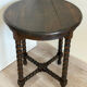 Antique turned wooden side table with authentic charm.