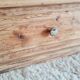 Old wooden chest of drawers raw and black wood