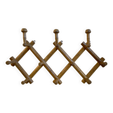 Oak accordion coat rack with 10 hooks