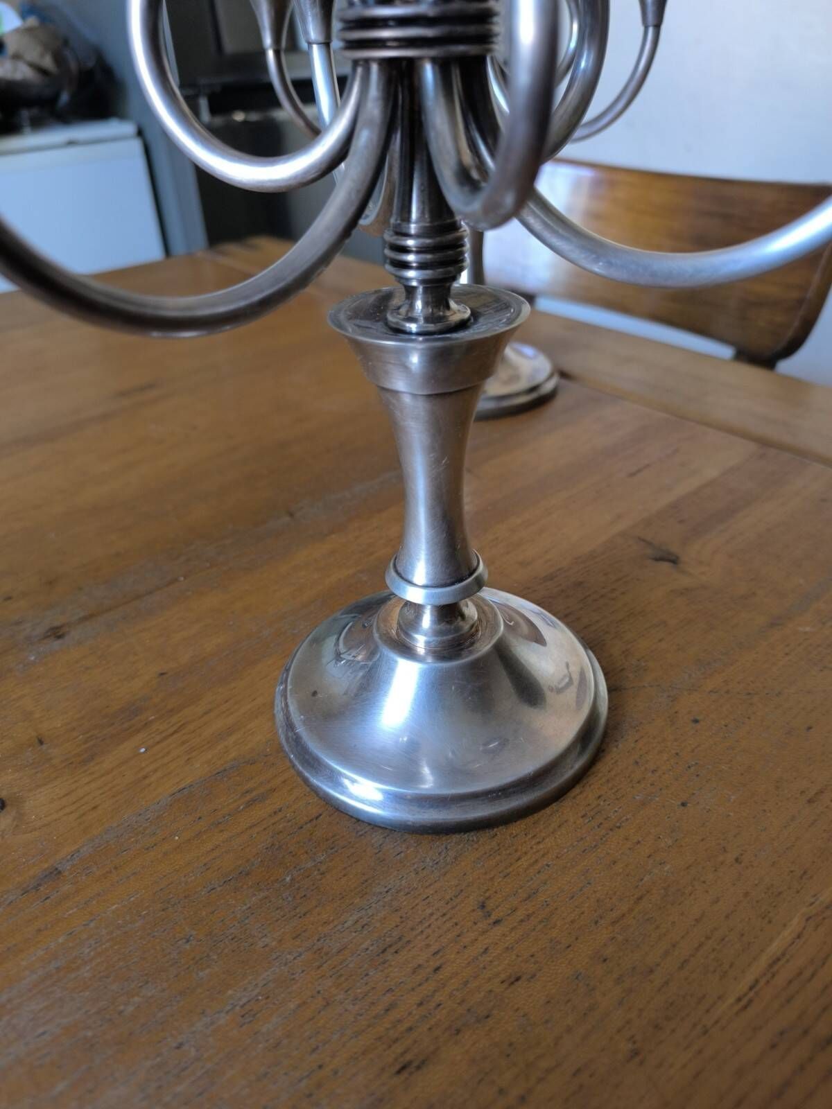 Ercuis pair of candlesticks model Cheverny in silver-plated metal with hunting horn decoration.