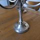 Ercuis pair of candlesticks model Cheverny in silver-plated metal with hunting horn decoration.