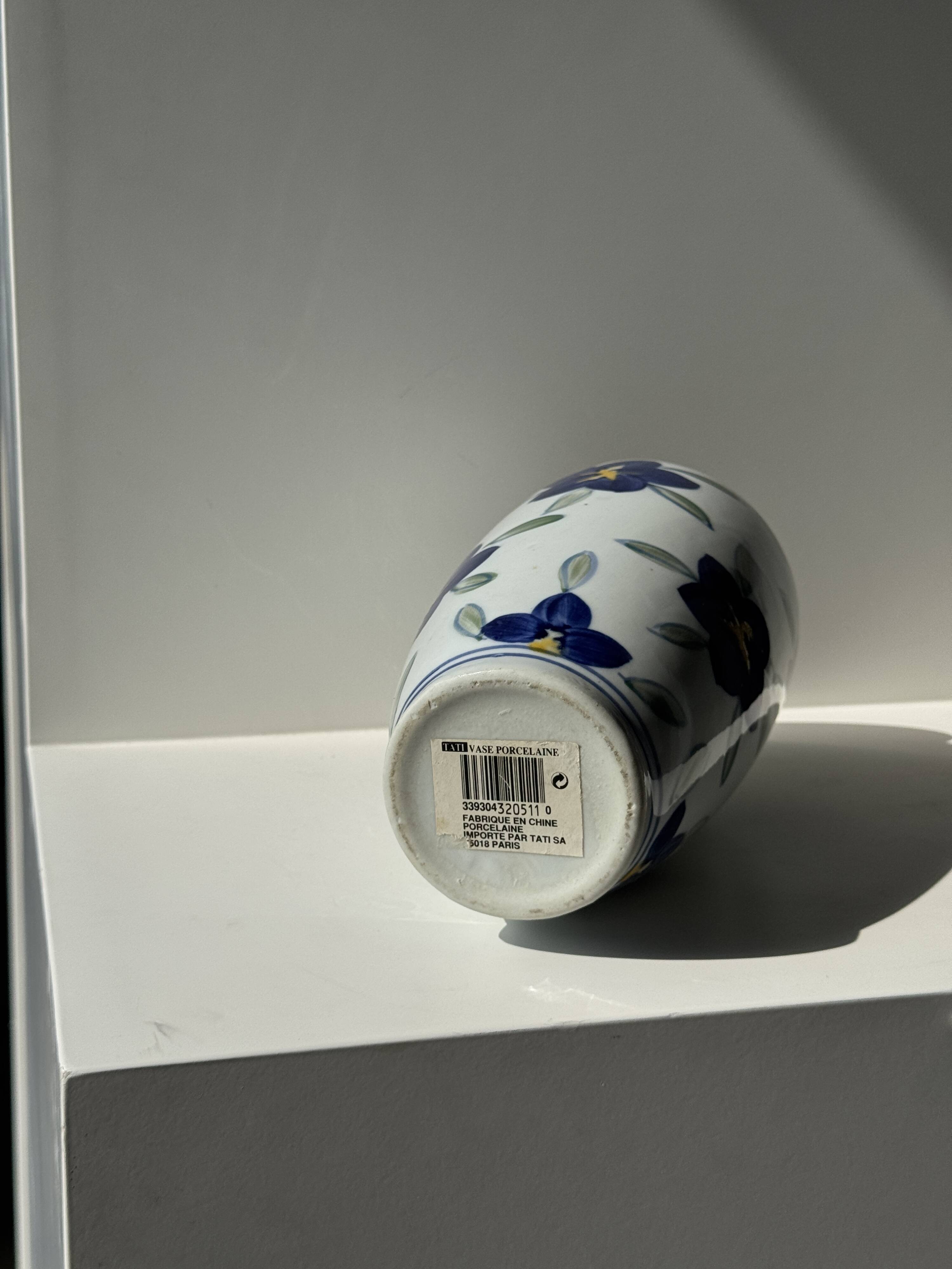 Vase white background stylized blue, yellow and green flowers H24.5 D12